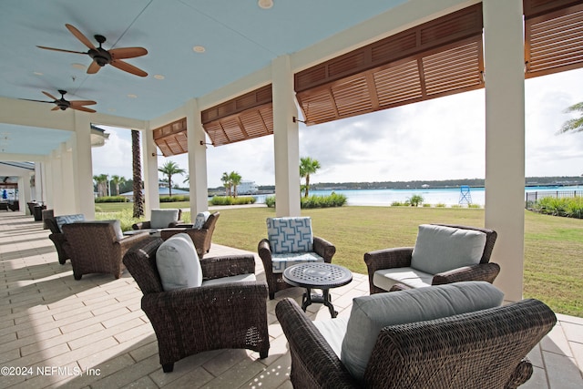 view of patio / terrace featuring outdoor lounge area and a water view