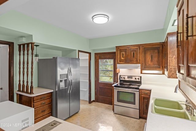 kitchen featuring sink and appliances with stainless steel finishes