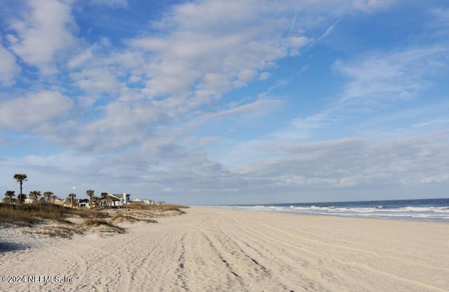 property view of water featuring a view of the beach