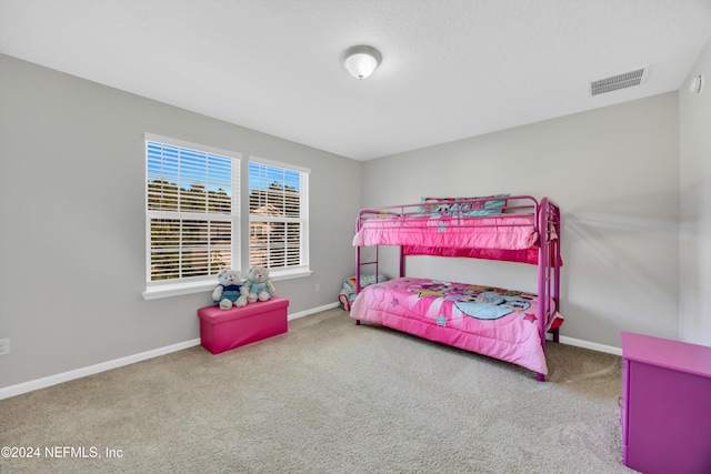 bedroom featuring carpet