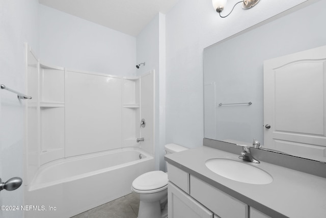 full bathroom featuring toilet, vanity, tile patterned floors, and shower / bathtub combination