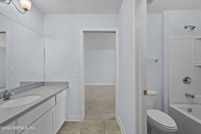 full bathroom with tile patterned floors, a textured ceiling, toilet, and shower / bathtub combination