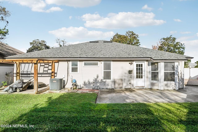 back of property featuring a patio area, a yard, and cooling unit