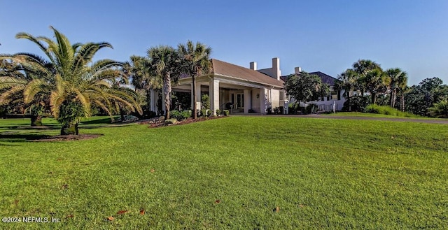 view of front facade with a front yard