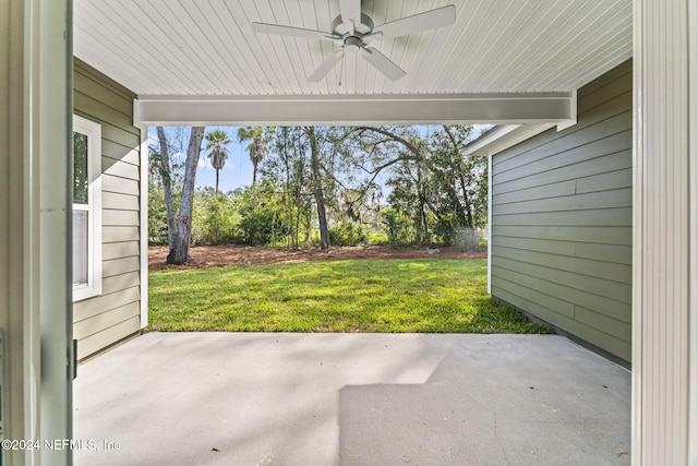 view of patio featuring ceiling fan