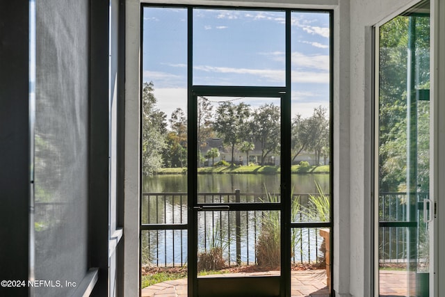 doorway featuring a water view