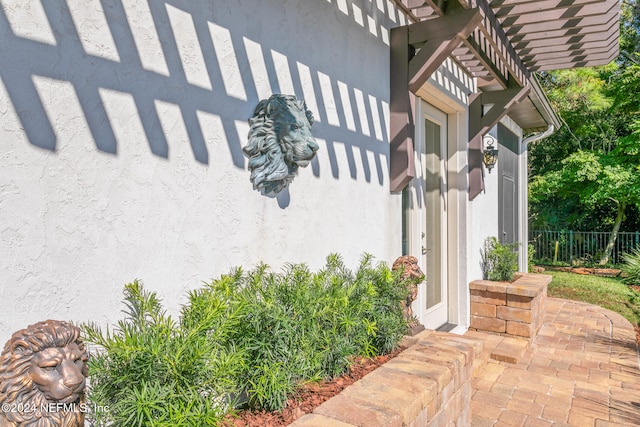 exterior space featuring a pergola