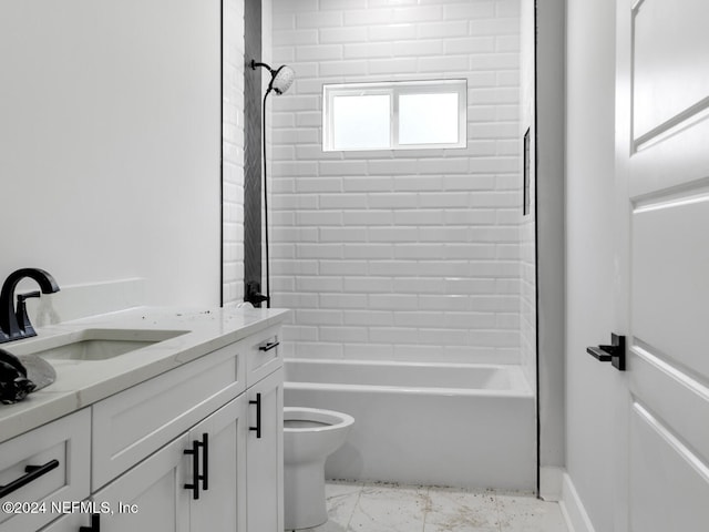 full bathroom with vanity, toilet, and tiled shower / bath combo