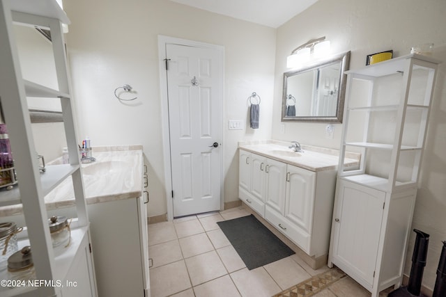 bathroom with vanity and tile patterned floors