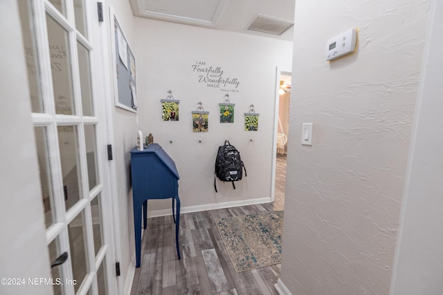 interior space with hardwood / wood-style flooring