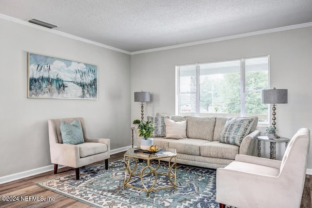 living room featuring crown molding, a textured ceiling, and hardwood / wood-style flooring