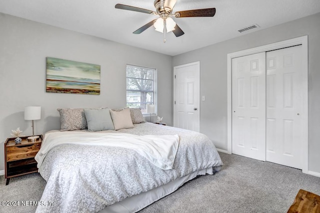 bedroom featuring carpet flooring, ceiling fan, and a closet