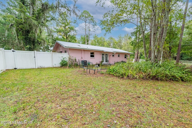 view of yard featuring central AC