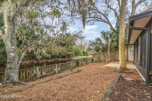 view of yard featuring a water view