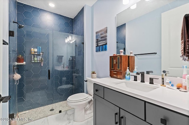 bathroom with vanity, toilet, and an enclosed shower