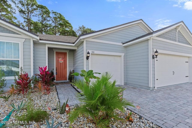 view of front of house with a garage