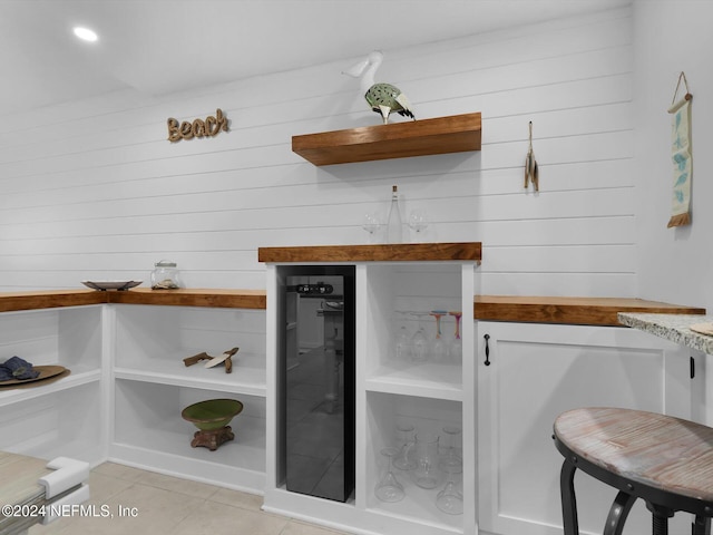8550 A1A S Unit 13131, Saint Augustine, FL 32080 - detailed view of open shelves, a dry bar, white cabinets, and beverage cooler