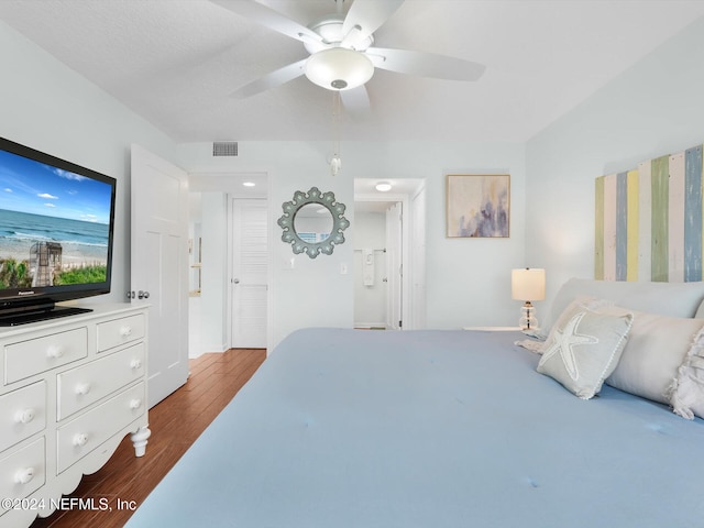 bedroom featuring wood-type flooring and ceiling fan