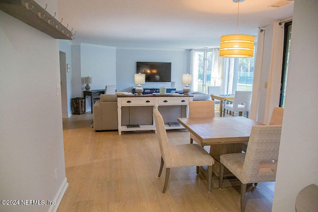 dining room featuring light wood-type flooring