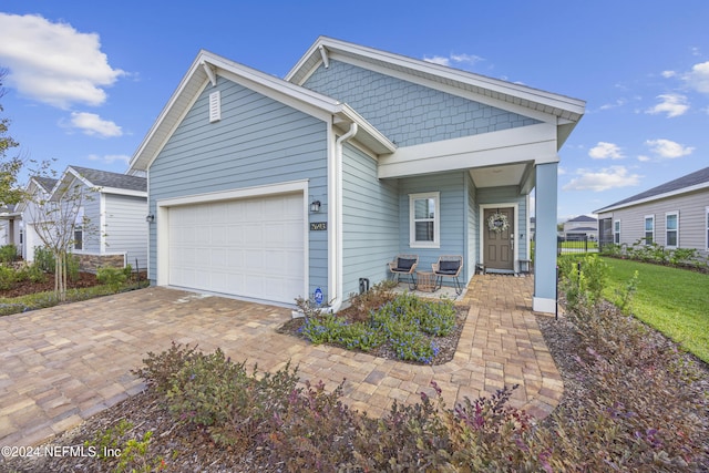 view of front of property featuring a garage