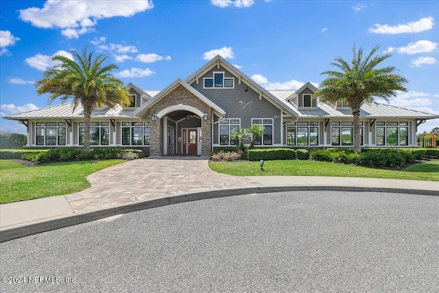 view of front of home with a front lawn