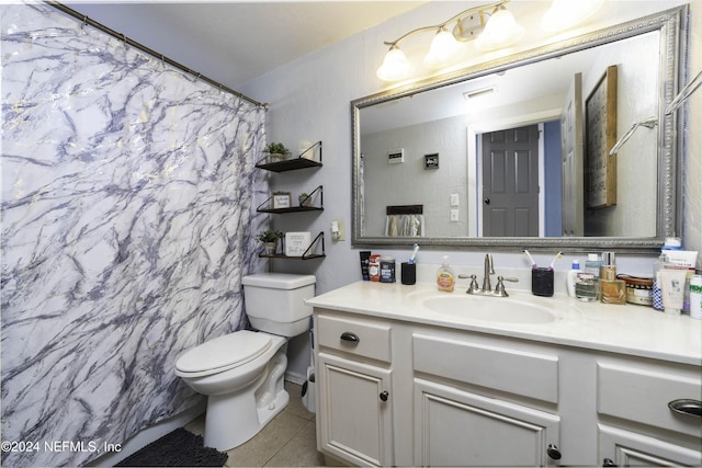 bathroom with tile patterned flooring, vanity, toilet, and a shower with shower curtain