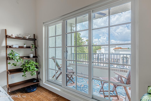 doorway to outside with hardwood / wood-style flooring