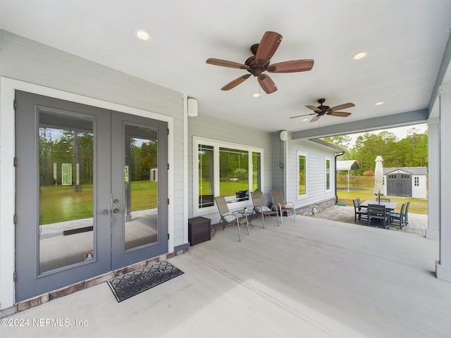 view of patio featuring ceiling fan and french doors