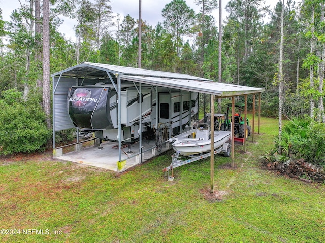 view of vehicle parking with a carport and a lawn