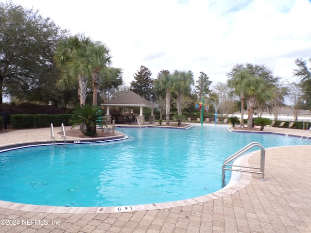 view of pool with a gazebo and a patio area