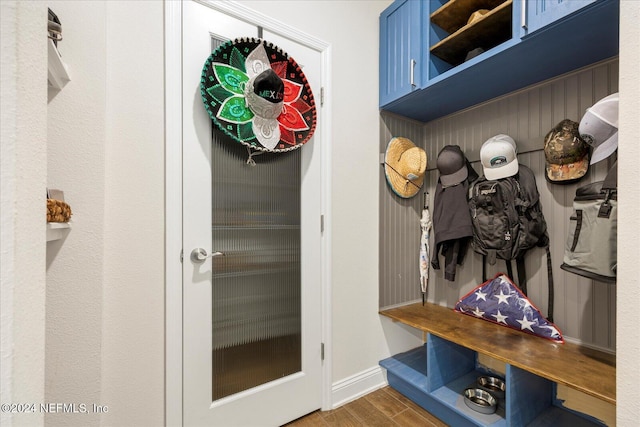 mudroom featuring dark wood-type flooring