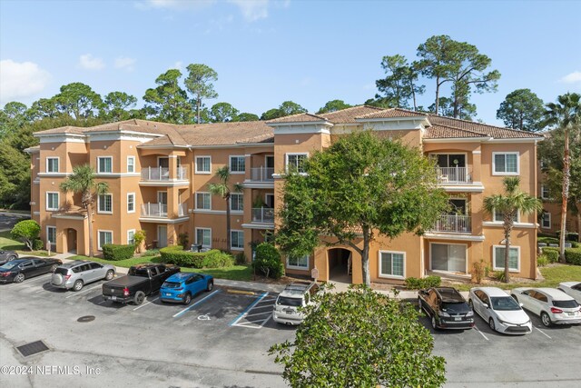 605 Fairway Dr Unit 205, Saint Augustine, FL 32084 - view of property featuring uncovered parking