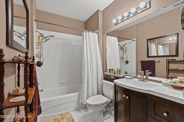 605 Fairway Dr Unit 205, Saint Augustine, FL 32084 - bathroom featuring tile patterned flooring, toilet, shower / bath combo, and vanity