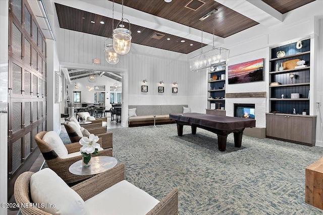 recreation room featuring beam ceiling, built in features, carpet, and wooden ceiling