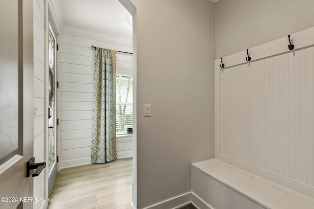 mudroom with light hardwood / wood-style flooring