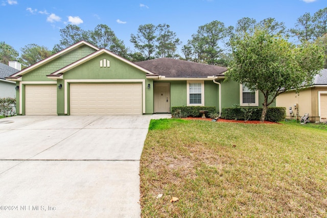 single story home featuring a garage and a front lawn