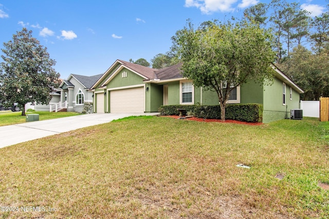 ranch-style home with a front yard, a garage, and central air condition unit