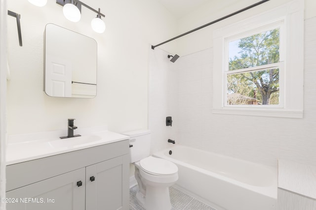 full bathroom with bathing tub / shower combination, tile patterned floors, vanity, and toilet