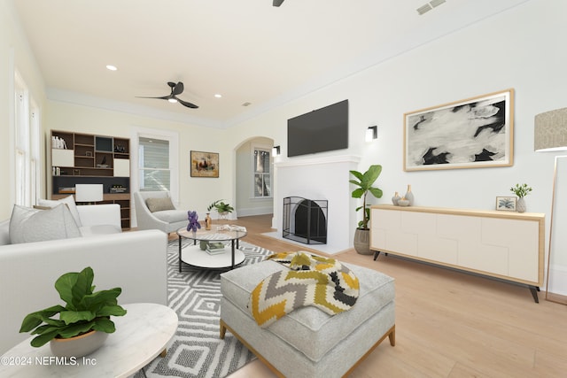 living room featuring light hardwood / wood-style flooring and ceiling fan