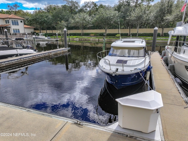 view of dock with a water view