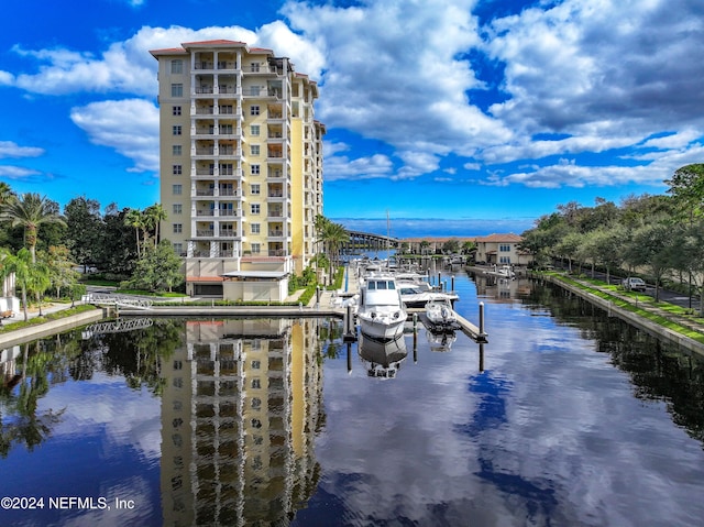 property view of water with a dock