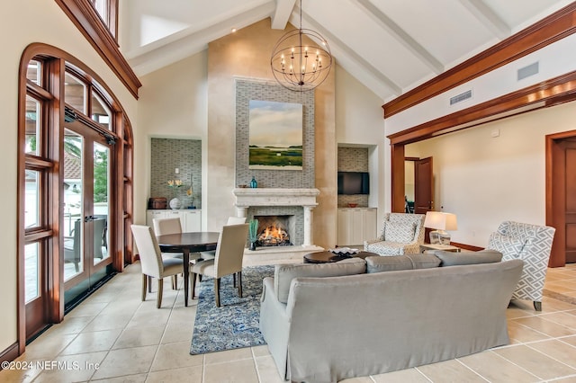 living room featuring beamed ceiling, high vaulted ceiling, a chandelier, and light tile patterned floors