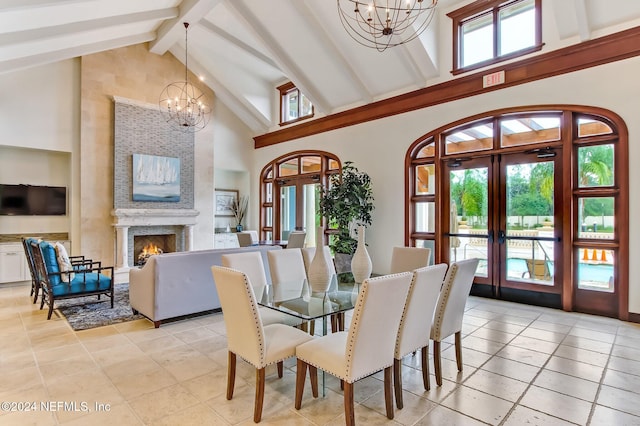 dining room with high vaulted ceiling, an inviting chandelier, french doors, light tile patterned floors, and beamed ceiling