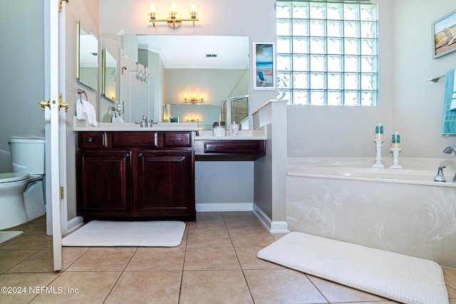 bathroom with tile patterned flooring, a bathing tub, toilet, and vanity