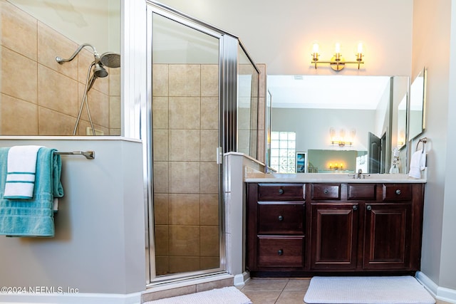 1854 W Cobblestone Ln, Saint Augustine, FL 32092 - bathroom featuring a shower stall, vanity, tile patterned flooring, and crown molding