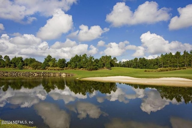 1854 W Cobblestone Ln, Saint Augustine, FL 32092 - water view featuring a golf course and a tree filled landscape
