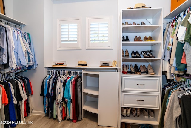 1854 W Cobblestone Ln, Saint Augustine, FL 32092 - walk in closet featuring light wood finished floors