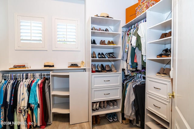 1854 W Cobblestone Ln, Saint Augustine, FL 32092 - walk in closet with light wood-type flooring