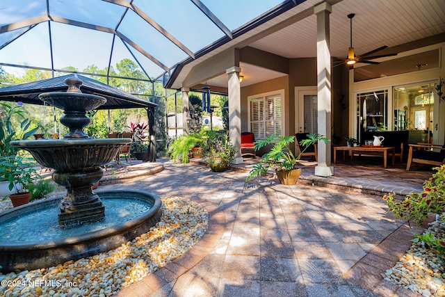 1854 W Cobblestone Ln, Saint Augustine, FL 32092 - view of patio / terrace featuring a ceiling fan, an outdoor hangout area, and glass enclosure