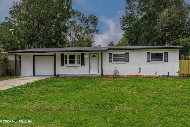 ranch-style house with a porch, a garage, and a front lawn